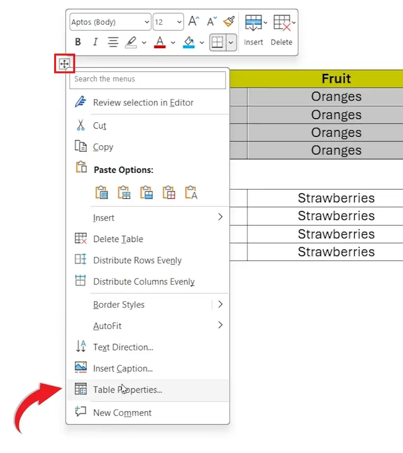 Microsoft Word table context menu showing table properties option with arrow highlighting how to merge two tables